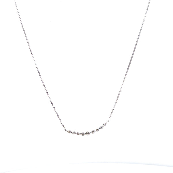 Cadena 9 diamantes oro blanco.