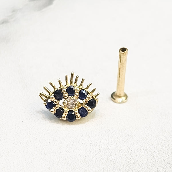 Piercing ojo turco con pestañas