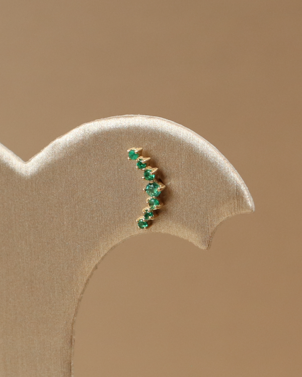 Piercing stunning oro blanco con Esmeraldas